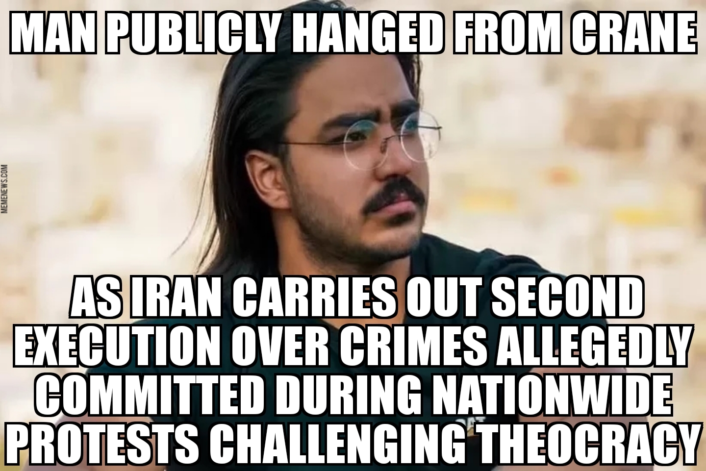 Iran hangs man from crane